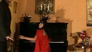 Vintage girl caned on the piano